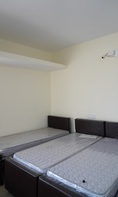 Double Sharing Room at Nandana Elite PG